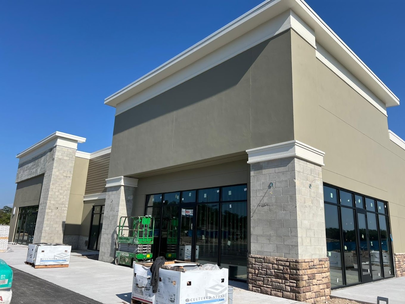 Commercial storefront exterior painted by Tony's Paint Solutions
